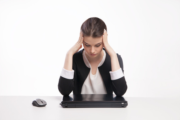 Tired woman in front of  laptop - Φωτογραφία, εικόνα