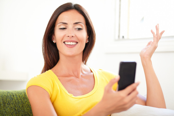 Caucasian woman using a mobile phone - 写真・画像