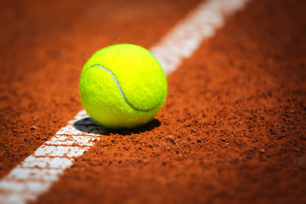 Tennis Ball on a tennis court - Foto, immagini
