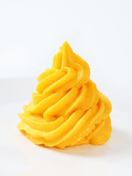 Swirl van gele room  - Foto, afbeelding