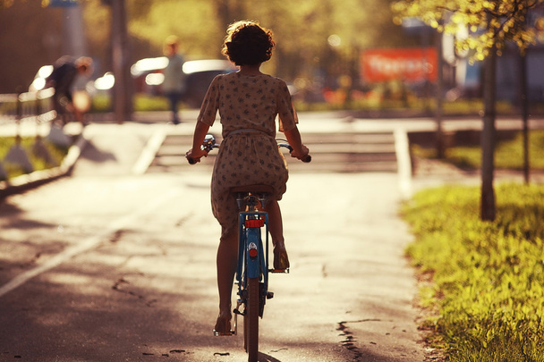 young girl  riding retro  bicycle - Φωτογραφία, εικόνα
