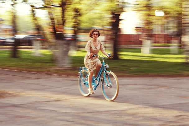 happy girl on a bicycle - 写真・画像