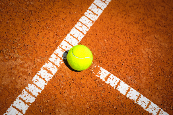 Tennis Ball on a tennis court - Foto, immagini