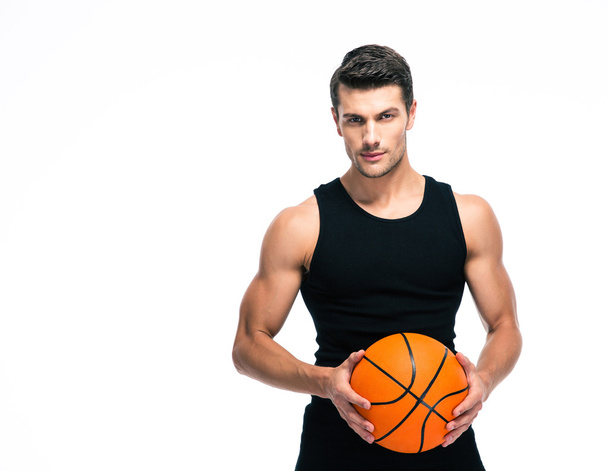Portrait of a basketball player with ball - Foto, Bild