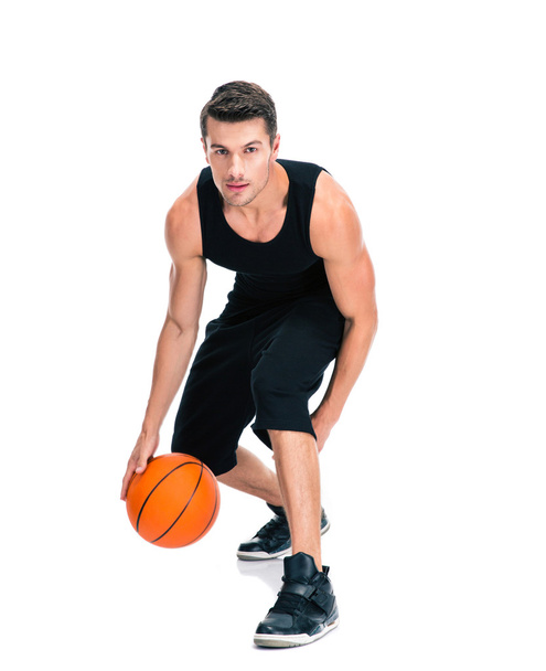Portrait of a handsome man playing in basketball - Foto, Imagen