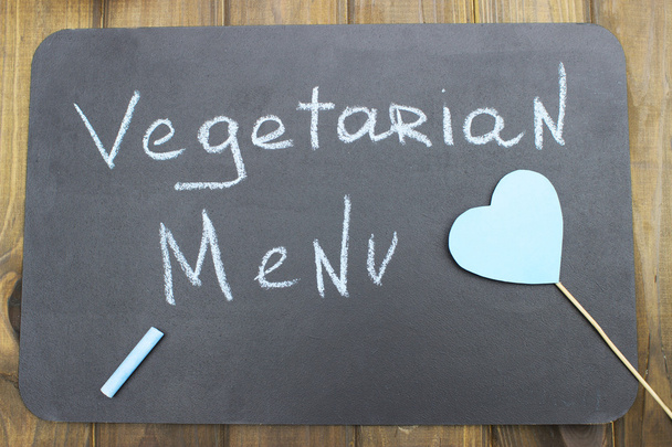 planche à craie sur laquelle est écrit un menu végétarien
 - Photo, image