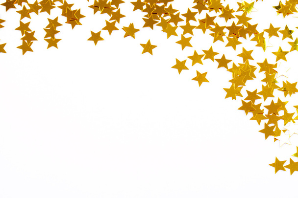 Christmas decoration of golden confetti stars - Photo, image