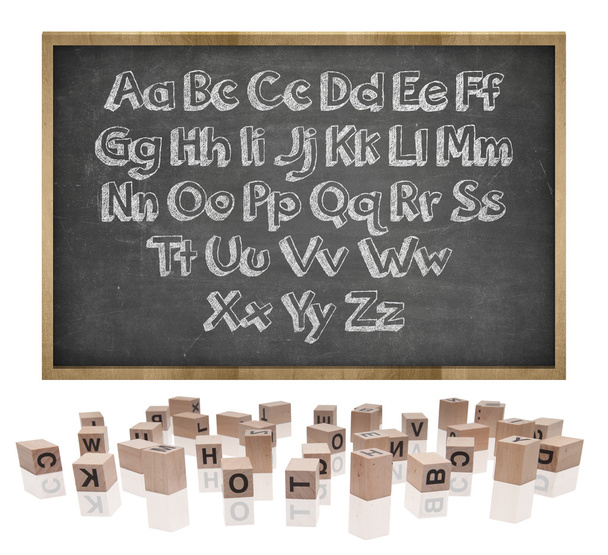 Alphabets concept on blackboard with wooden frame and block letters - Photo, Image