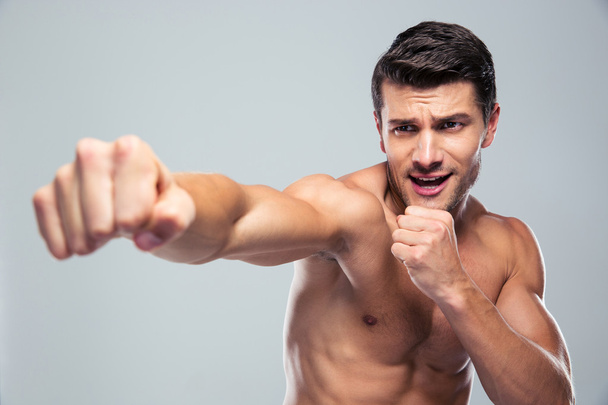 Muscular man fighting  - Foto, immagini