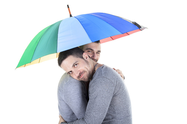 A homosexual couple over a white background - Foto, imagen