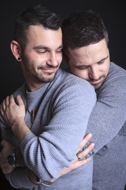 Gay couple on black background - Фото, изображение