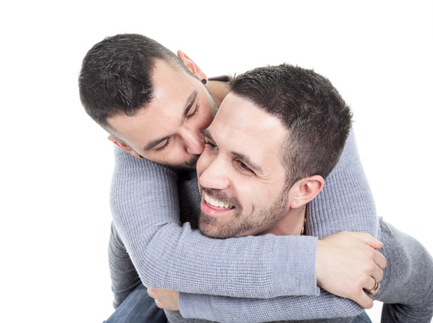 A homosexual couple over a white background - Foto, Bild