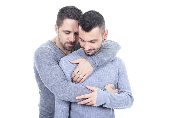 A homosexual couple over a white background - Foto, immagini