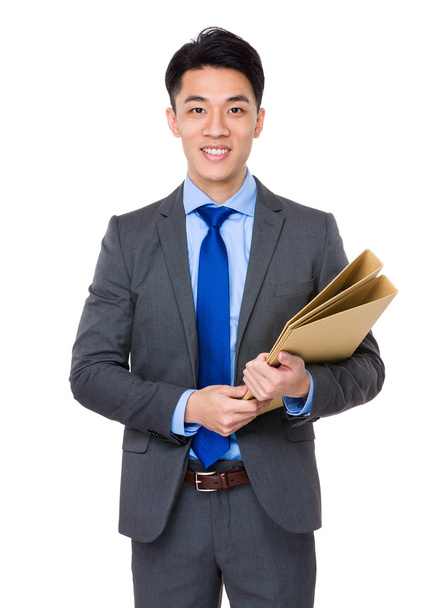 Asian businessman holding  folders - Photo, image