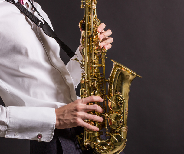 man plays saxophone - Fotografie, Obrázek