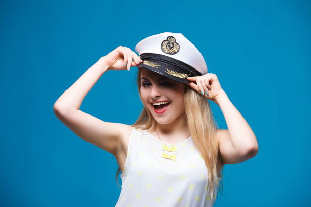 beautiful girl in style of pin-up, Dresses captain cap - Fotoğraf, Görsel