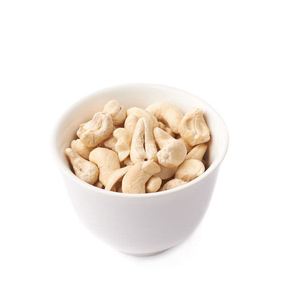 Bowl filled with cashew nuts - Valokuva, kuva