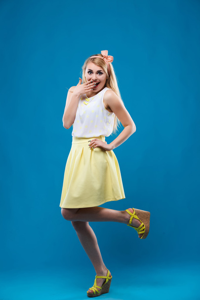 girl in the studio, pin-up, flirting, showing different emotions - Foto, Imagen