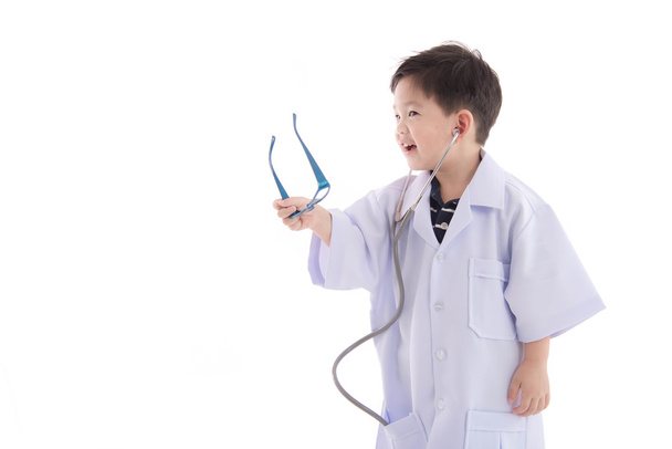 carino asiatico bambino in un medici uniforme
 - Foto, immagini