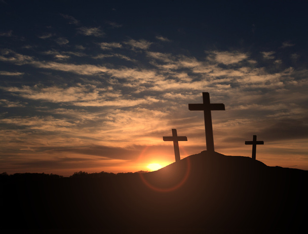 Trois croix au coucher du soleil
 - Photo, image