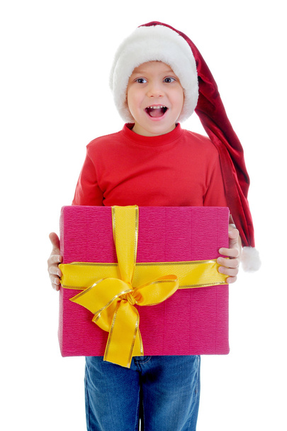 Cheerful boy in Santa Claus hat - 写真・画像