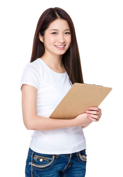Asian young woman holding  clipboard - Photo, Image