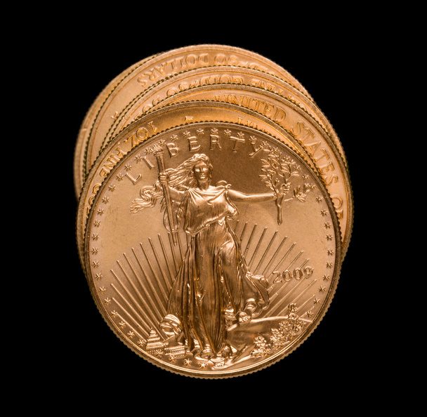Стек золотих монет орла
 - Фото, зображення