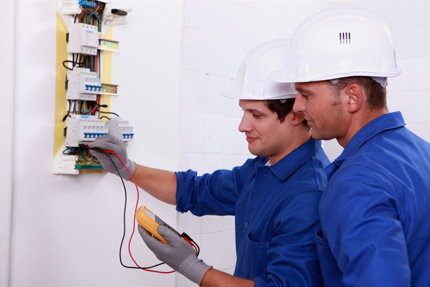 Two electricians performing checks - Foto, immagini