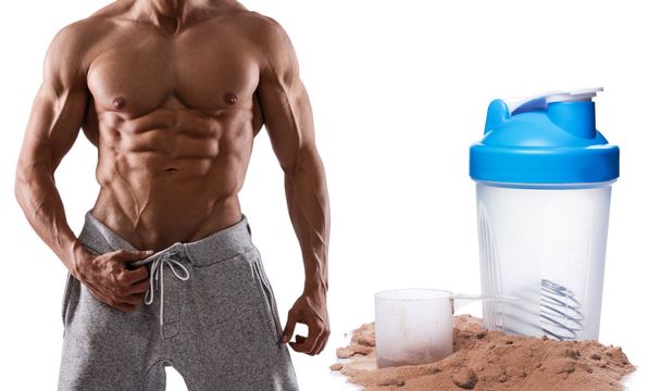 Muscular male torso and protein powder - Foto, Imagem