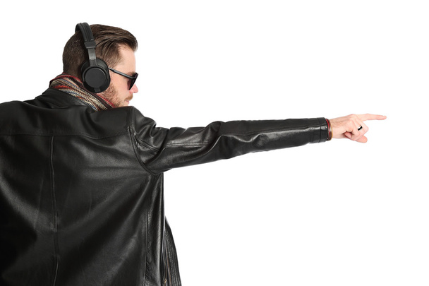 DJ in black leather jacket gesturing - Foto, Imagem