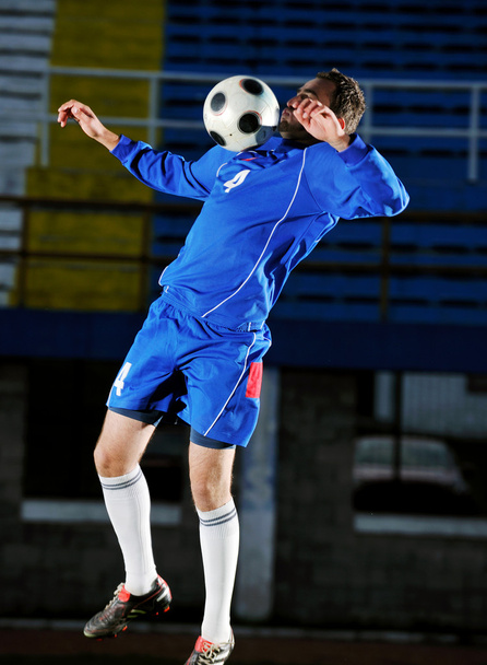 Football player in action - Valokuva, kuva