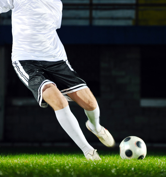 Football player in action - Valokuva, kuva