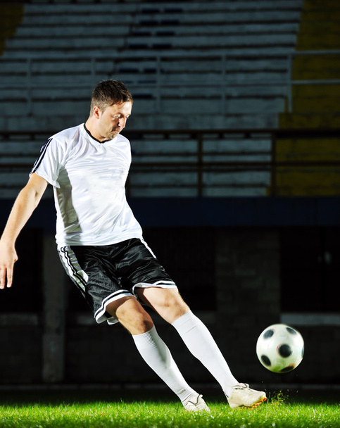Football player in action - Fotó, kép