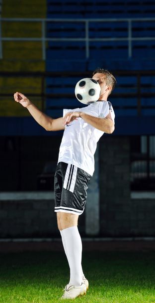 Football player in action - Φωτογραφία, εικόνα
