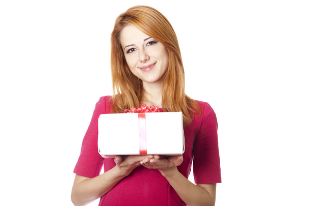 Beautiful red-haired girl with present box - Фото, зображення