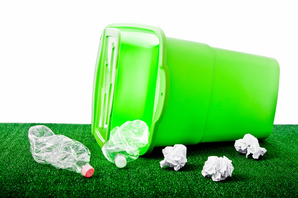Rubbish bin with plastic bottles and papers - Photo, image