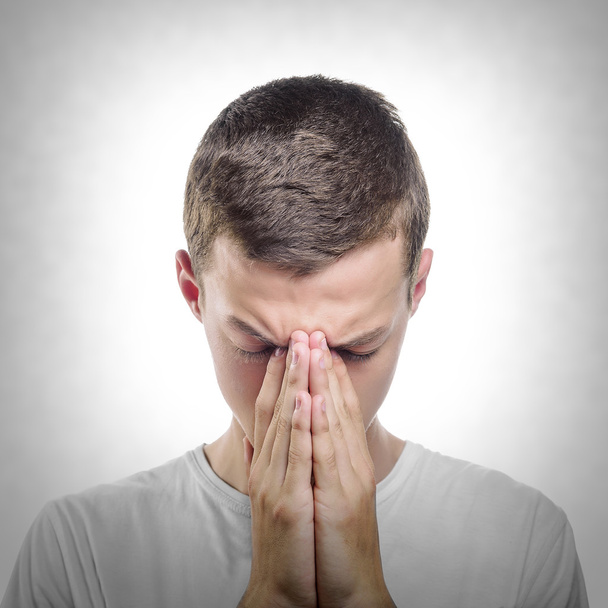 Young man praying or thinking - Photo, Image