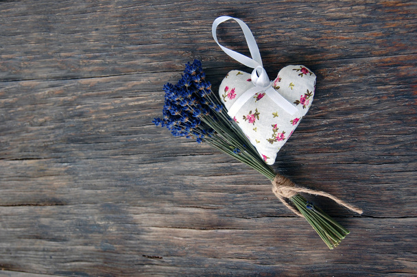 Lavender flowers and lavender bag on table - Photo, Image