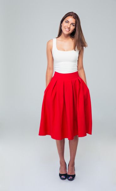 Full length portrait of attractive smiling woman in skirt - Photo, Image
