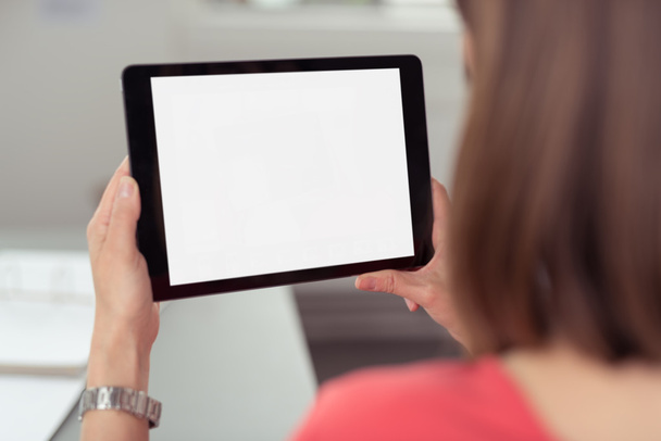 Woman using a tablet PC - Fotó, kép