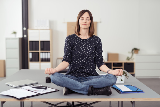 Office Woman on the Table Doing Yoga Exercise - Fotoğraf, Görsel