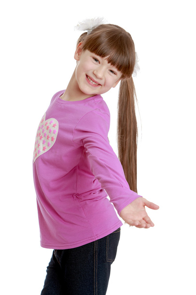 Happy smiling girl with a long braid wearing  - Photo, image