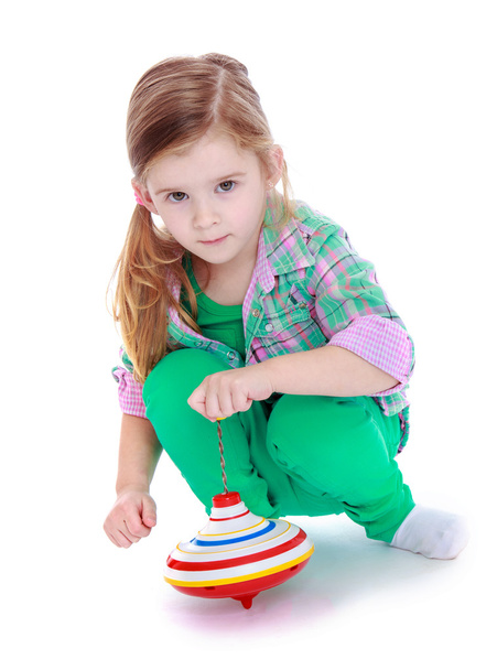  Portrait of little adorable girl blonde which spins the dreidel - Фото, изображение