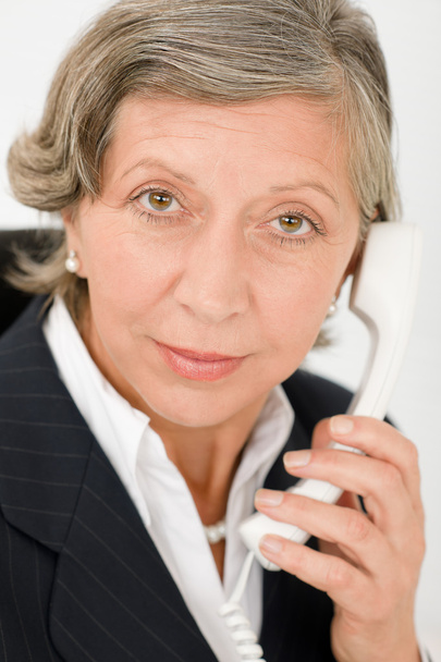 Senior businesswoman on phone close-up portrait - Zdjęcie, obraz
