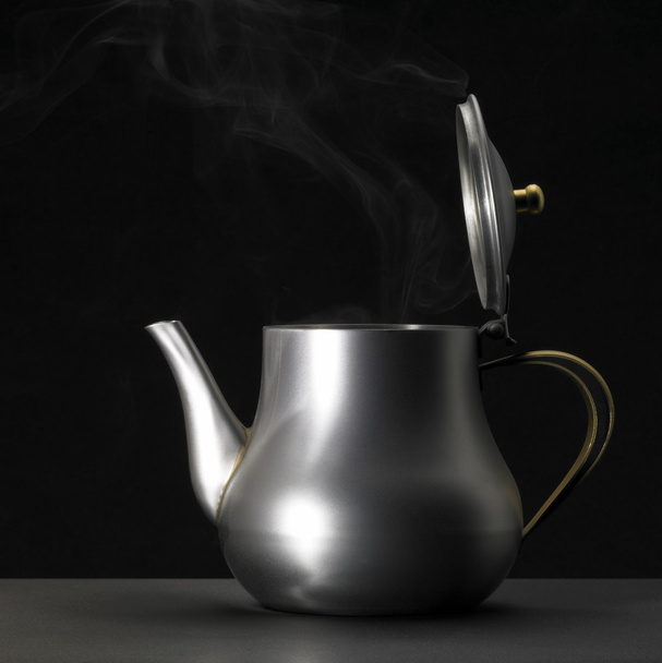 Metallic tea pot sideways - Foto, imagen