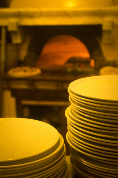 Italiaanse pizzeria pizza restaurant oven platen - Foto, afbeelding