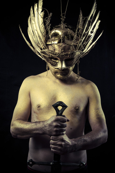 Warrior with helmet and sword - Fotografie, Obrázek