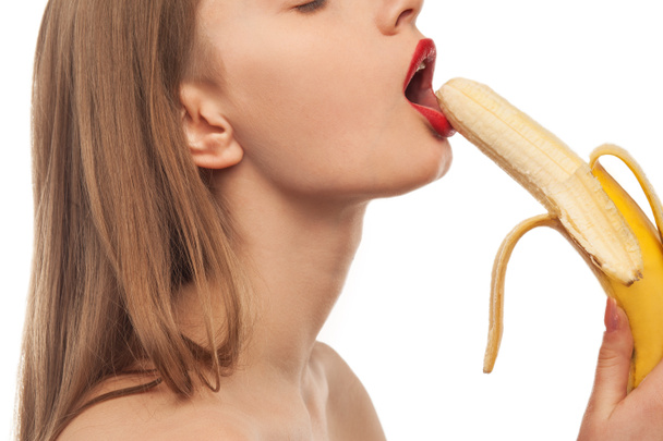 horny girl eats and licks the banana, oral sex - Photo, Image