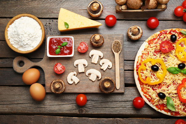 Food ingredients for pizza on table close up - Фото, зображення