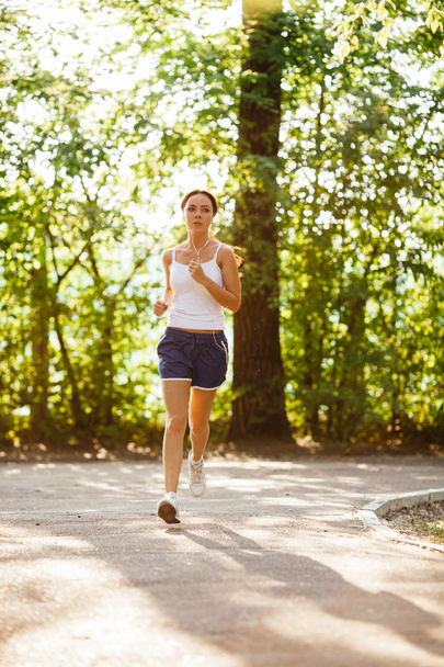 woman running in the park - Photo, image